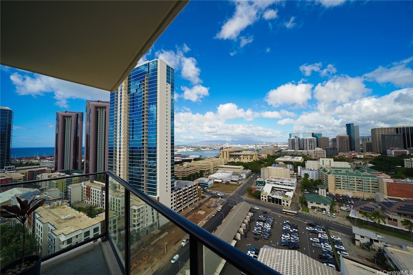 An absolute gem!! This high floor, corner-end, Makai/Ewa facing - Beach Condo for sale in Honolulu, Hawaii on Beachhouse.com