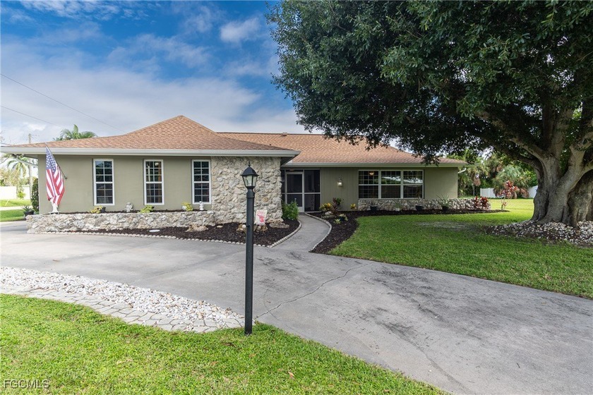 Set on a generous corner lot, this 3-bedroom, 2-bath pool home - Beach Home for sale in Fort Myers, Florida on Beachhouse.com