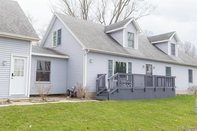 This stunning Cape Cod-style home offers over 3,000 square feet - Beach Home for sale in Newport, Michigan on Beachhouse.com