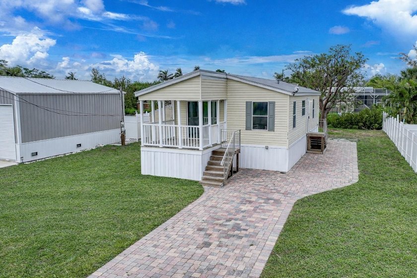 Welcome to this adorable waterfront home, perfectly positioned - Beach Home for sale in Punta Gorda, Florida on Beachhouse.com