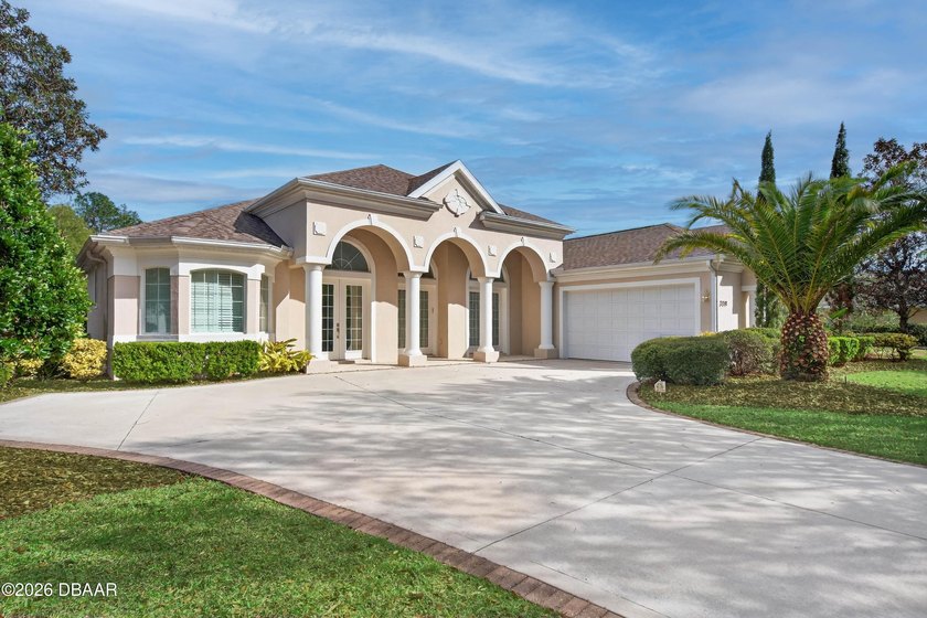 Inspired by excellence, this estate-sized former Town & Country - Beach Home for sale in Palm Coast, Florida on Beachhouse.com
