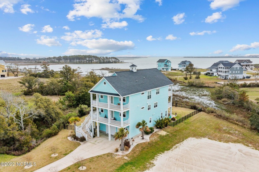 From a distance, this stunning waterfront home appears to have - Beach Home for sale in Morehead City, North Carolina on Beachhouse.com