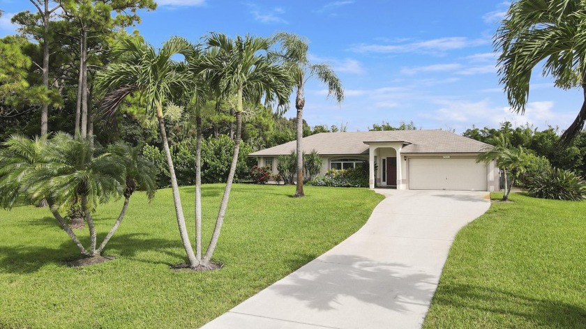 Tranquility Awaits:  This gorgeous 3- Bedroom, 2-Bathroom, 2-Car - Beach Home for sale in Palm Beach Gardens, Florida on Beachhouse.com