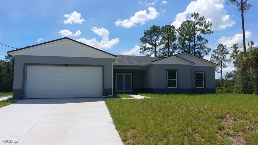 Discover modern living at its finest in this breathtaking NEW - Beach Home for sale in Lehigh Acres, Florida on Beachhouse.com