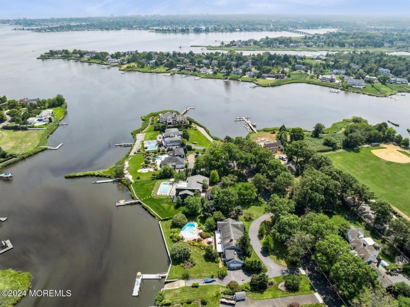 Welcome to this stunning WATERFRONT property nestled amongst - Beach Home for sale in Rumson, New Jersey on Beachhouse.com