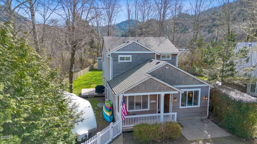 A stunning creekfront home nestled in the serene community of - Beach Home for sale in Neskowin, Oregon on Beachhouse.com