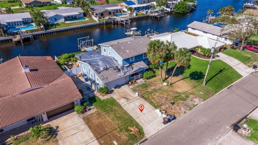 This spacious two-story, 5-bedroom, 2.5-bathroom home offers - Beach Home for sale in St. Petersburg, Florida on Beachhouse.com