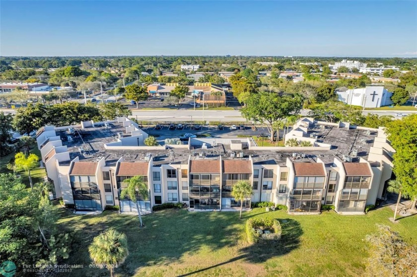 End unit with large screened patio overlooking the Colony West - Beach Condo for sale in Tamarac, Florida on Beachhouse.com