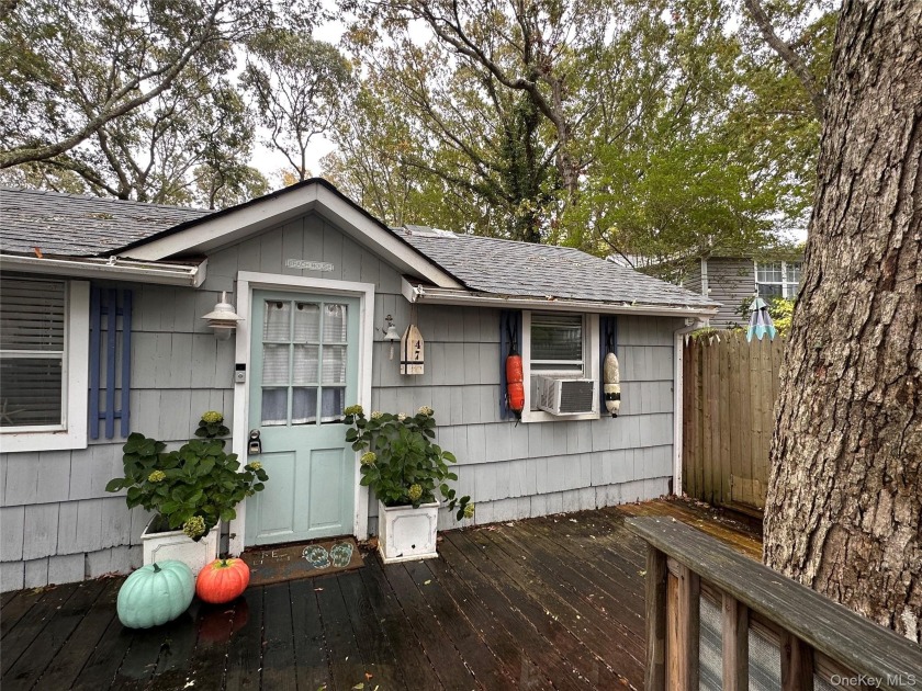 As far as Beach Cottages go this one SCREAMS beach vibes from - Beach Home for sale in Baiting Hollow, New York on Beachhouse.com
