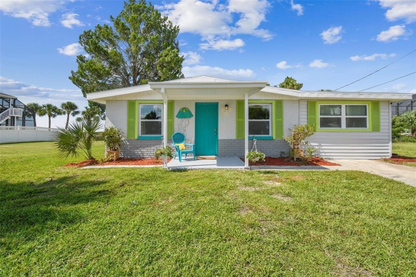 This home has EXQUISITE REAR VIEWS OF THE MARSH and so much room - Beach Home for sale in Hernando Beach, Florida on Beachhouse.com