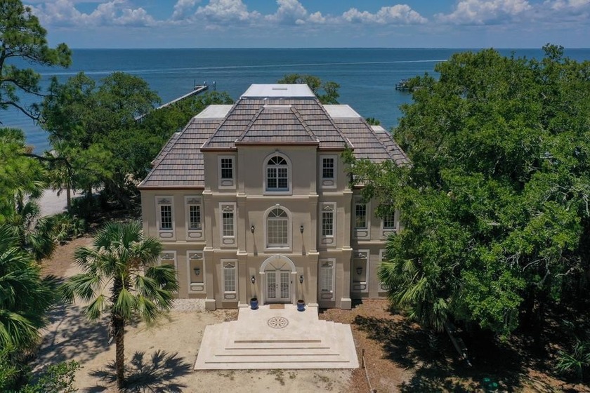 *Maison Rose* Exquisite Bayfront French Chateau nestled in - Beach Home for sale in St. George Island, Florida on Beachhouse.com