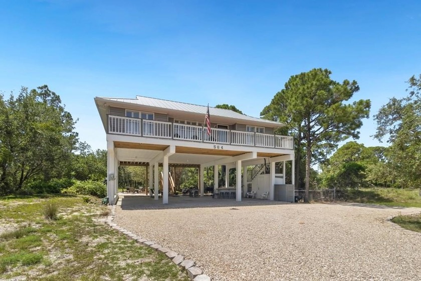 Renovated St George Island home nestled quietly on a high, dry - Beach Home for sale in St. George Island, Florida on Beachhouse.com