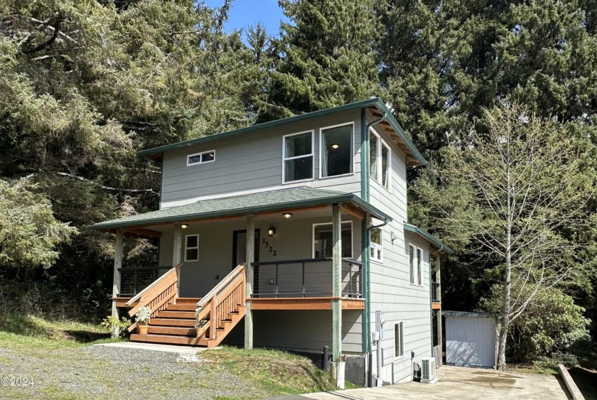 This inviting 1541 sq ft. home features 2 bedrooms & 3 full - Beach Home for sale in Lincoln City, Oregon on Beachhouse.com