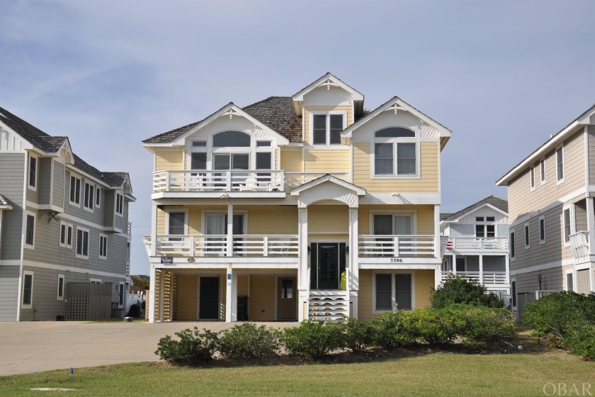 This stunning semi-oceanfront residence boasts an expansive - Beach Home for sale in Nags Head, North Carolina on Beachhouse.com