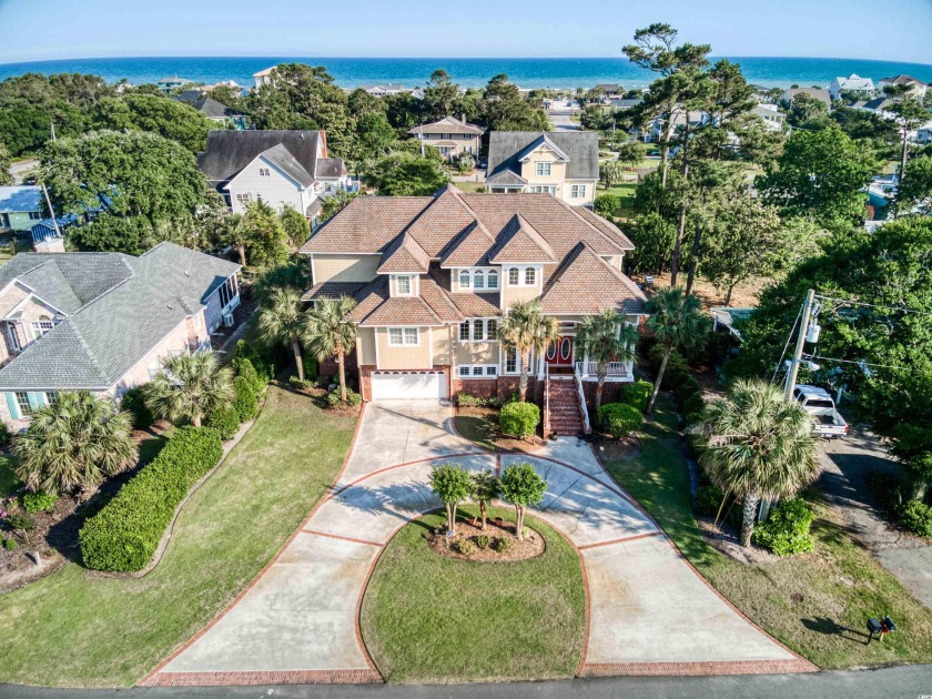Exquisite 4-bedroom, 4.5-bath home in the most sought after - Beach Home for sale in North Myrtle Beach, South Carolina on Beachhouse.com