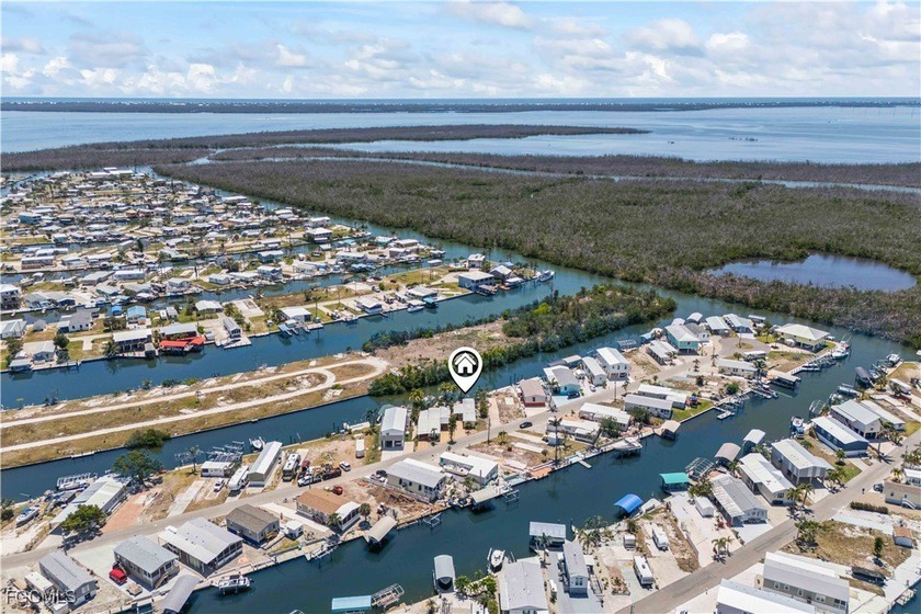 Direct Gulf Access charming home! Gorgeous west facing view of - Beach Home for sale in St. James City, Florida on Beachhouse.com