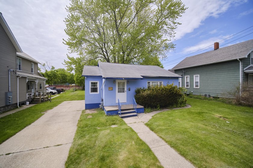 Charming 1940 bungalow with great bones and a layout that just - Beach Home for sale in Manistee, Michigan on Beachhouse.com