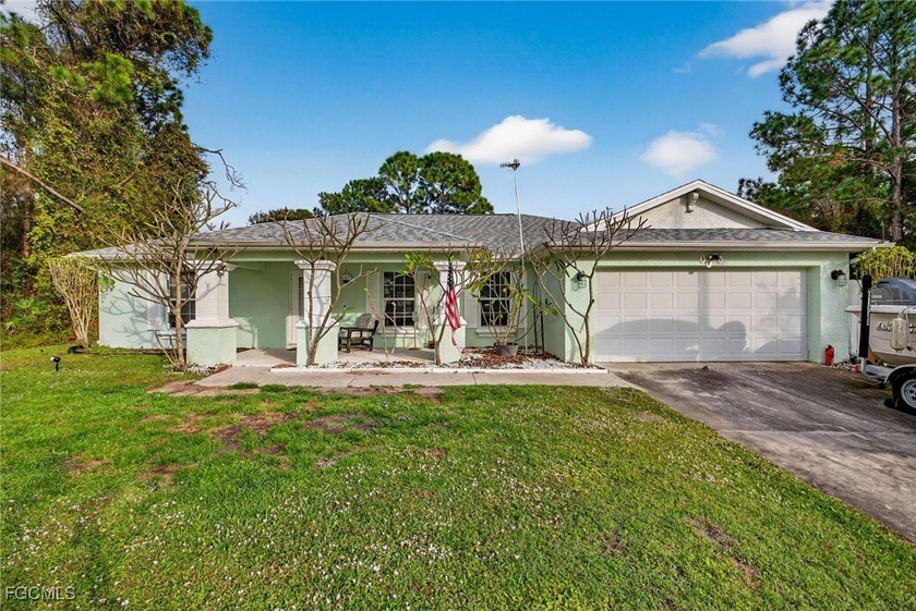 Welcome to this charming 3-bedroom, 2-bathroom home located on a - Beach Home for sale in Lehigh Acres, Florida on Beachhouse.com