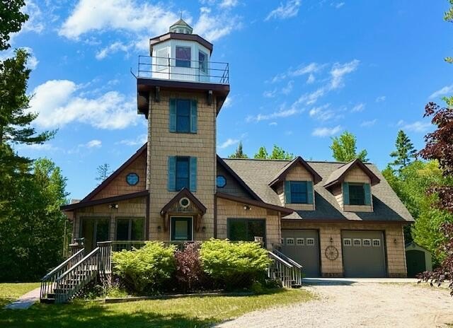 PRICE REDUCED! A truly unique lighthouse-style home with - Beach Home for sale in De Tour Village, Michigan on Beachhouse.com