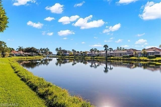 Welcome to this exceptional Capri model lakefront home in - Beach Home for sale in Naples, Florida on Beachhouse.com