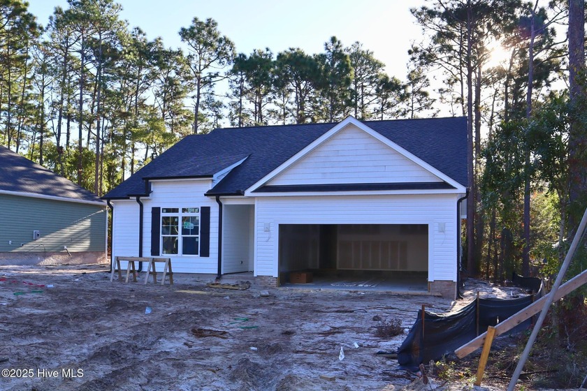 This brand-new home, currently under construction and expected - Beach Home for sale in Southport, North Carolina on Beachhouse.com