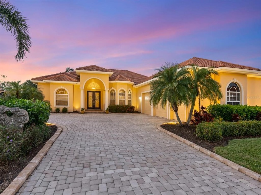 This lakefront custom home sits on an oversized cul-de-sac lot - Beach Home for sale in Englewood, Florida on Beachhouse.com