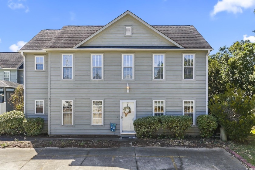 Welcome to this charming two-story patio home in the - Beach Home for sale in North Myrtle Beach, South Carolina on Beachhouse.com
