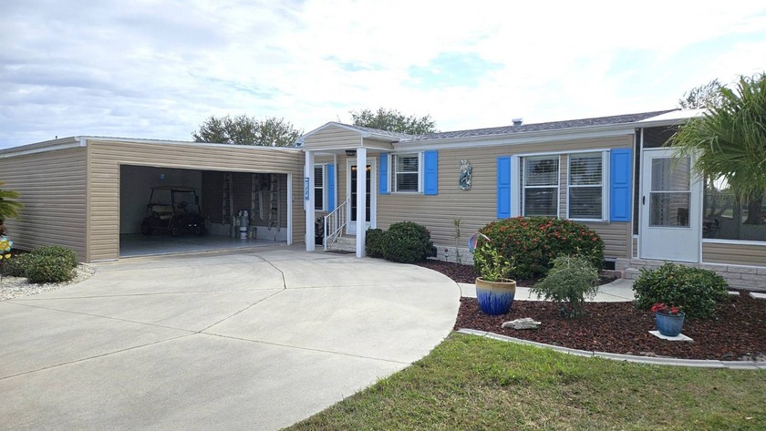 ***2 CAR GARAGE AND FREE GOLF CART*** This home is now PRICED TO - Beach Home for sale in Punta Gorda, Florida on Beachhouse.com