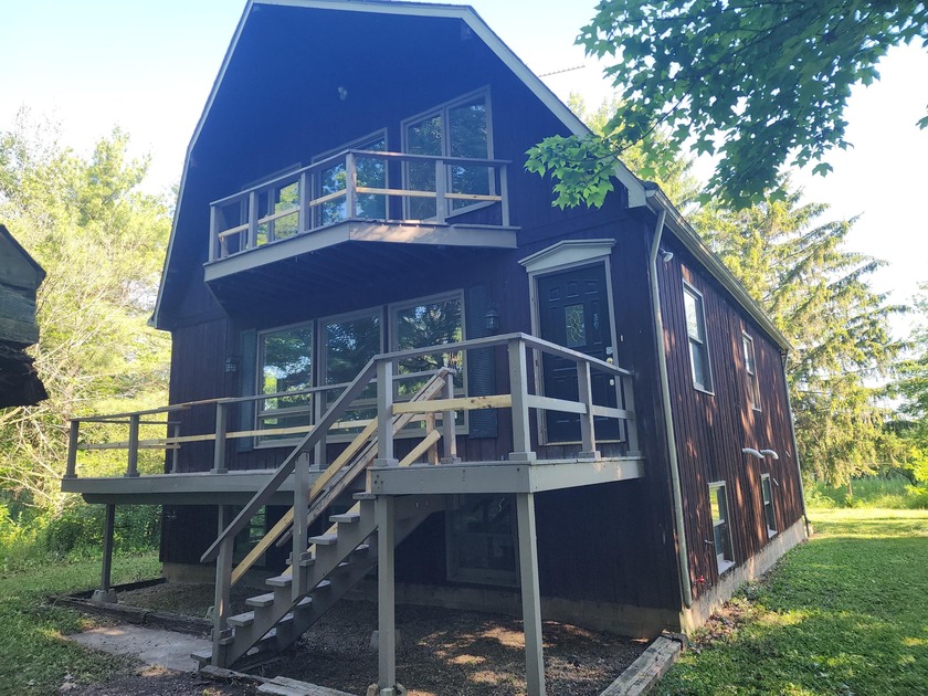 Discover a unique opportunity in Chesterton! Nestled on over 2 - Beach Home for sale in Chesterton, Indiana on Beachhouse.com