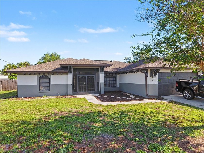 1/2 -Acre Lot + City Water! Space, flexibility, and room to - Beach Home for sale in North Port, Florida on Beachhouse.com