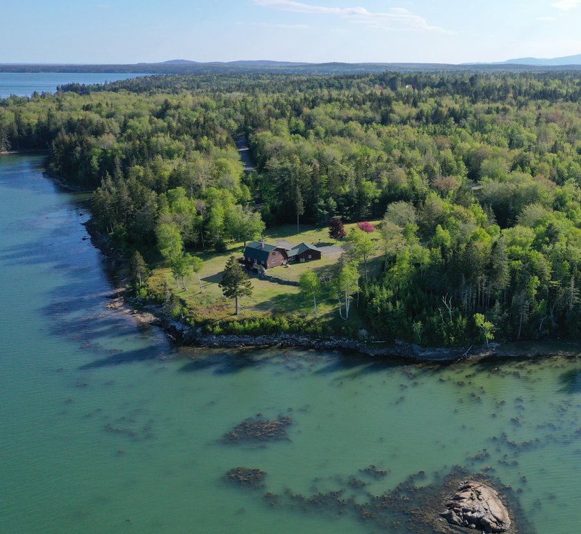 Nestled on 3+ acres with 340 feet of shoreline on Joy Bay, this - Beach Home for sale in Gouldsboro, Maine on Beachhouse.com