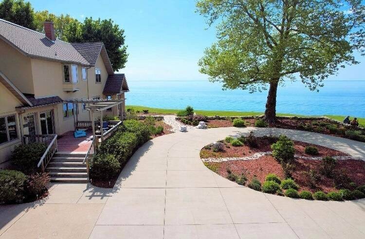 SPECTACULAR Lake Michigan waterfront estate situated on 4 - Beach Home for sale in Saint Joseph, Michigan on Beachhouse.com