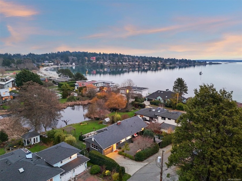 Welcome to this charming coastal retreat, tucked away on a quiet - Beach Home for sale in Saanich, BC on Beachhouse.com