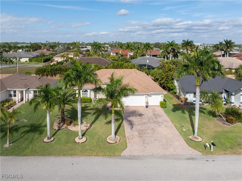 Custom-Built 3BR/4BA former model home with Resort-Style Pool!! - Beach Home for sale in Cape Coral, Florida on Beachhouse.com
