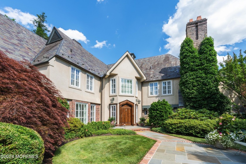 This stunning 5-bedroom, 5.5-bathroom English Tudor waterfront - Beach Home for sale in Red Bank, New Jersey on Beachhouse.com