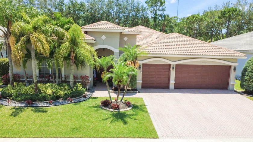 Spacious 4-bedroom, 3-bathroom courtyard home located in the - Beach Home for sale in Lake Worth, Florida on Beachhouse.com