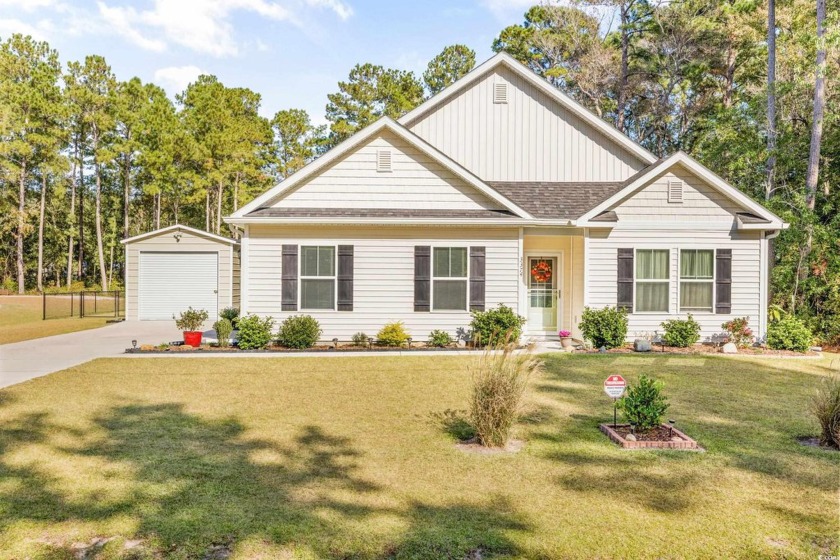 Discover coastal living at its finest in this spacious 4-bedroom - Beach Home for sale in Little River, South Carolina on Beachhouse.com