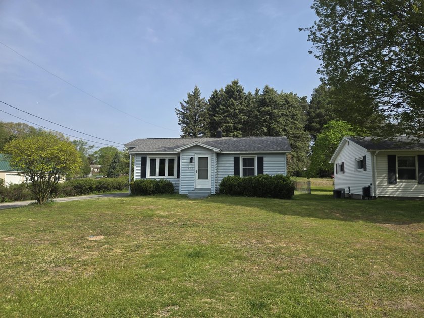 This immaculately maintained home in the Heart of Ludington is - Beach Home for sale in Ludington, Michigan on Beachhouse.com