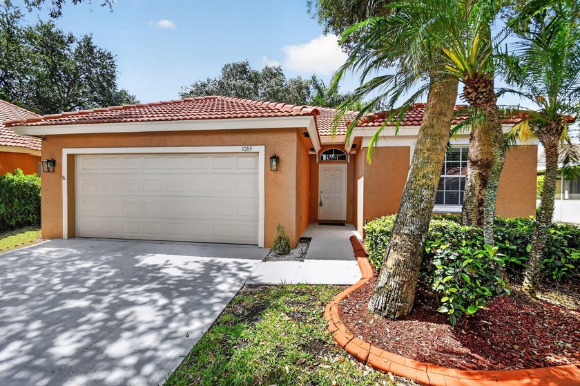 WOW - Awesome pool home with renovated kitchen, flooring and - Beach Home for sale in Riviera Beach, Florida on Beachhouse.com