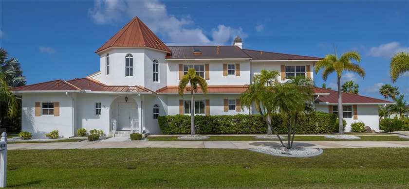 This stunning Mediterranean-style executive estate sits on two - Beach Home for sale in Punta Gorda, Florida on Beachhouse.com