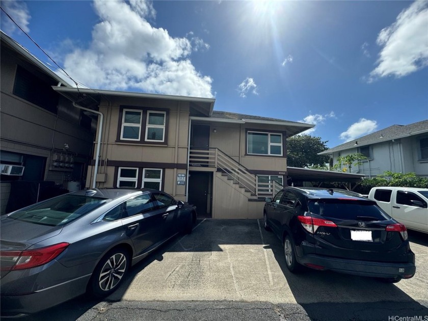 Located near UH, bus stops, and a freeway entrance, this fully - Beach Home for sale in Honolulu, Hawaii on Beachhouse.com