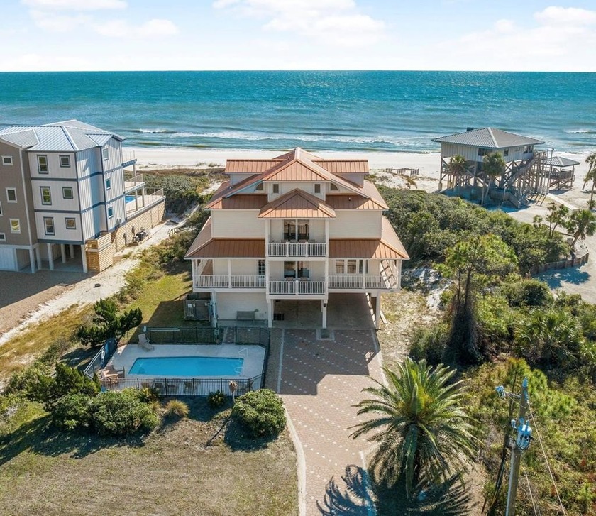 OPEN TO SELLER FINANCING! Situated on a pristine one-acre lot - Beach Home for sale in St. George Island, Florida on Beachhouse.com