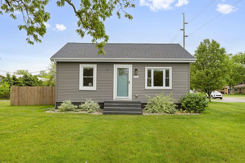 Completely reimagined and expanded in 2022, this home offers the - Beach Home for sale in Stevensville, Michigan on Beachhouse.com