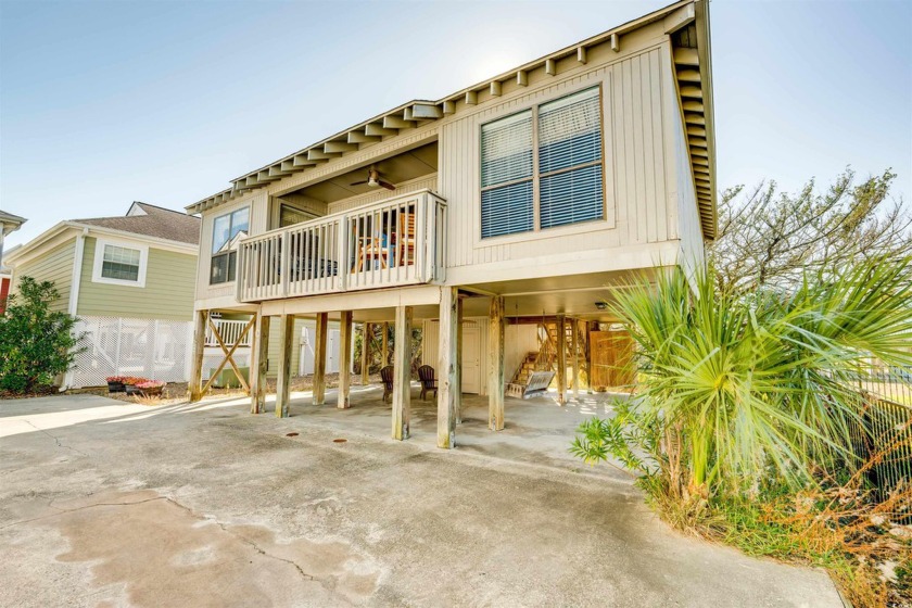 This charming beach getaway features three bedrooms, two baths - Beach Home for sale in Murrells Inlet, South Carolina on Beachhouse.com
