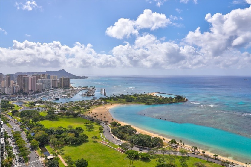 This remarkable residence is located with the prestigious Hokua - Beach Condo for sale in Honolulu, Hawaii on Beachhouse.com