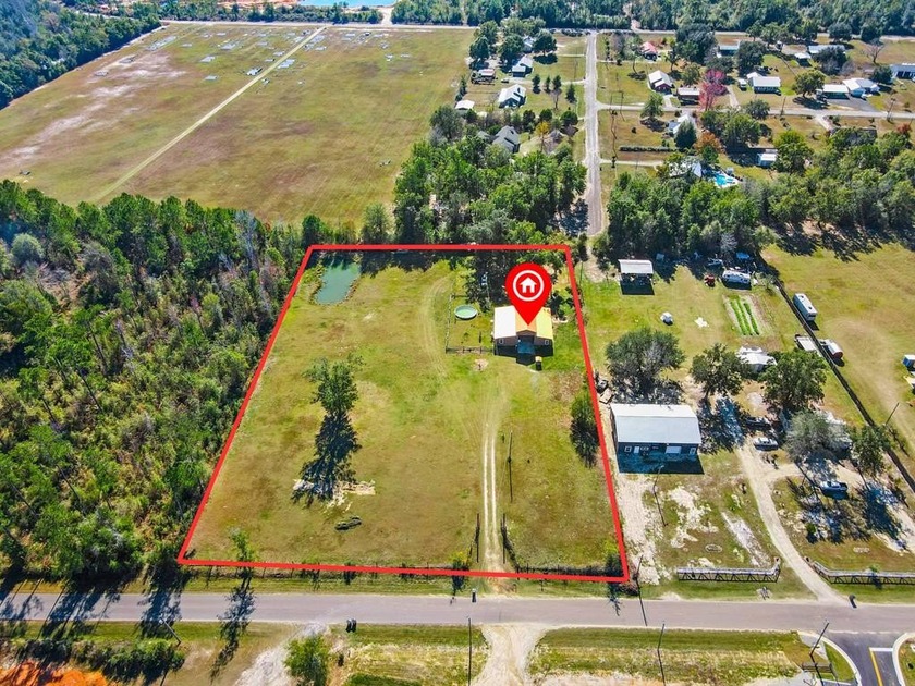 Imagine a lifestyle entwined with nature and tranquility: own a - Beach Acreage for sale in Wewahitchka, Florida on Beachhouse.com