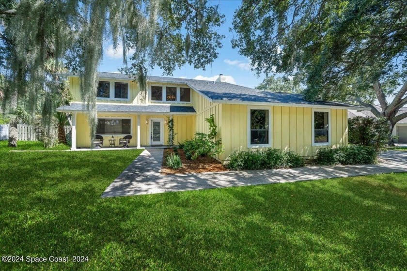 Welcome to Shady Lane, where majestic oak trees and cascading - Beach Home for sale in Merritt Island, Florida on Beachhouse.com