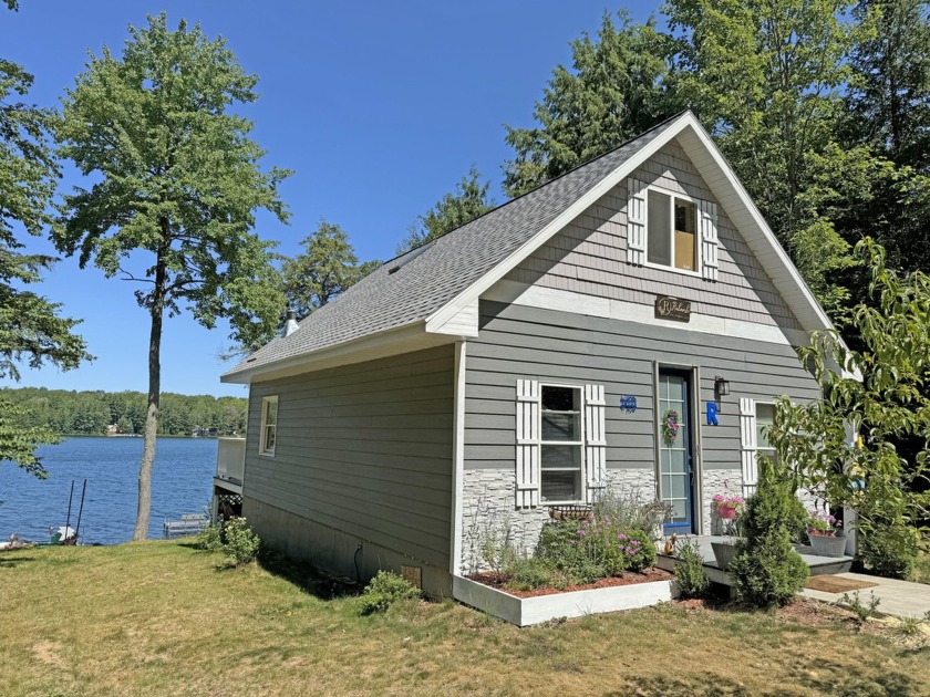 Serene Lake Front Living with 110 feet of lake shore on the - Beach Home for sale in Brimley, Michigan on Beachhouse.com