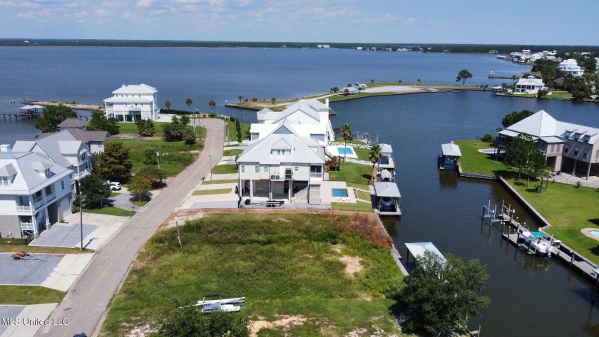 Great waterfront lot on Sandy Hook Dr., in Pass Christian - - Beach Lot for sale in Pass Christian, Mississippi on Beachhouse.com