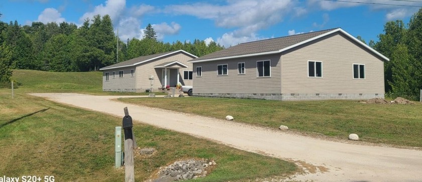 This multifaceted property is located just outside the city - Beach Lot for sale in Saint Ignace, Michigan on Beachhouse.com